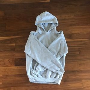 Grey hoodie with a company logo. Size M.